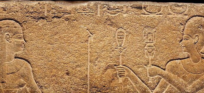 Egyptian relief. Caesarion is presenting gifts to the goddess Isis.