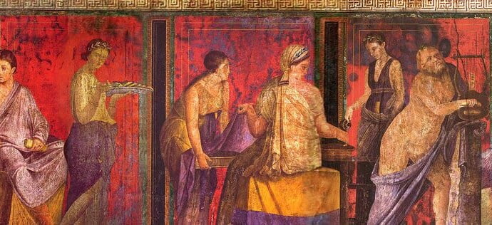 A long wall painting. There are many participants. Some play musical instruments, others carry trays, while others sit and watch the scene.