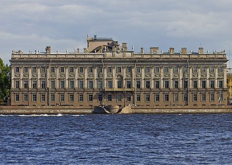 A large neoclassical three-storey palace. It is right on the river bank.