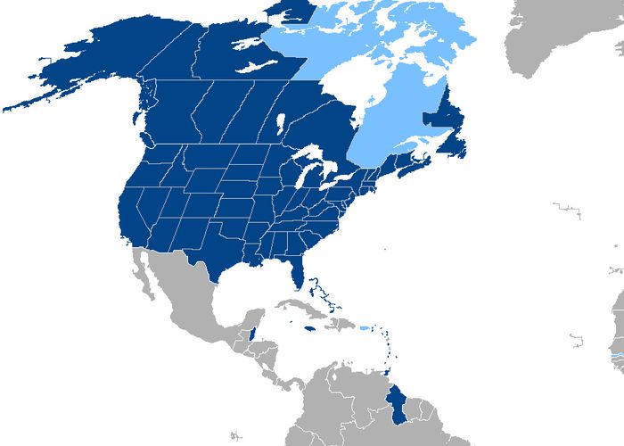 A map of the Americas showing the USA and Canada in deep blue.
