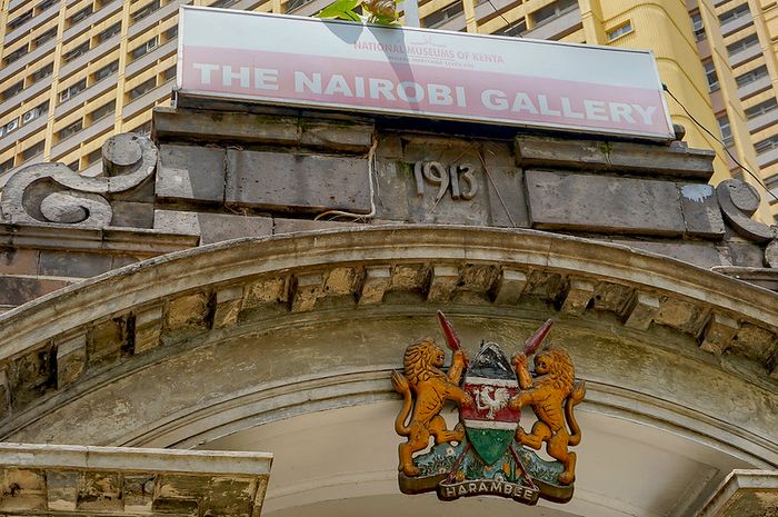 Close up of another building's entrance. Above it, there is a sign which reads "The Nairobi Gallery."