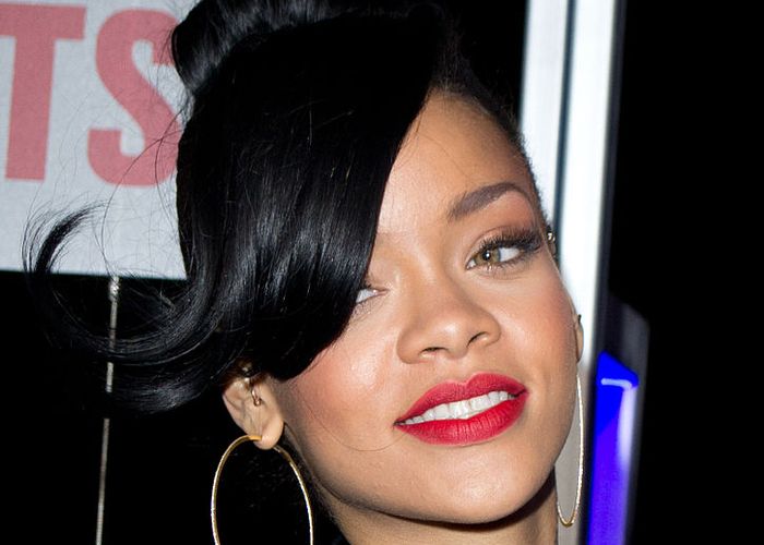 Picture of Rihanna wearing a black blazer.