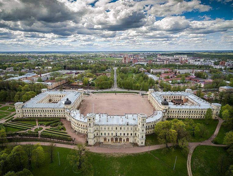 Aerial view of a large palace with several wings.