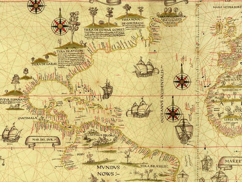 A close-up of the same map. It shows the eastern coast of the Americas. In North American there are several big drawings labeled with names like Tierra de Aylon and Tierra del Labrador.