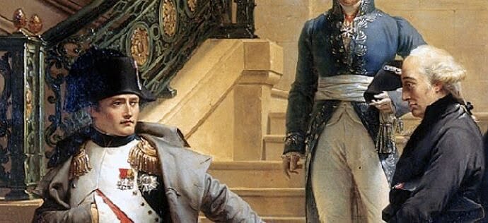 Napoleon and three other men walk inside a building. They are all sharply dressed in the French fashion of the time. Napoleon wears a military uniform.